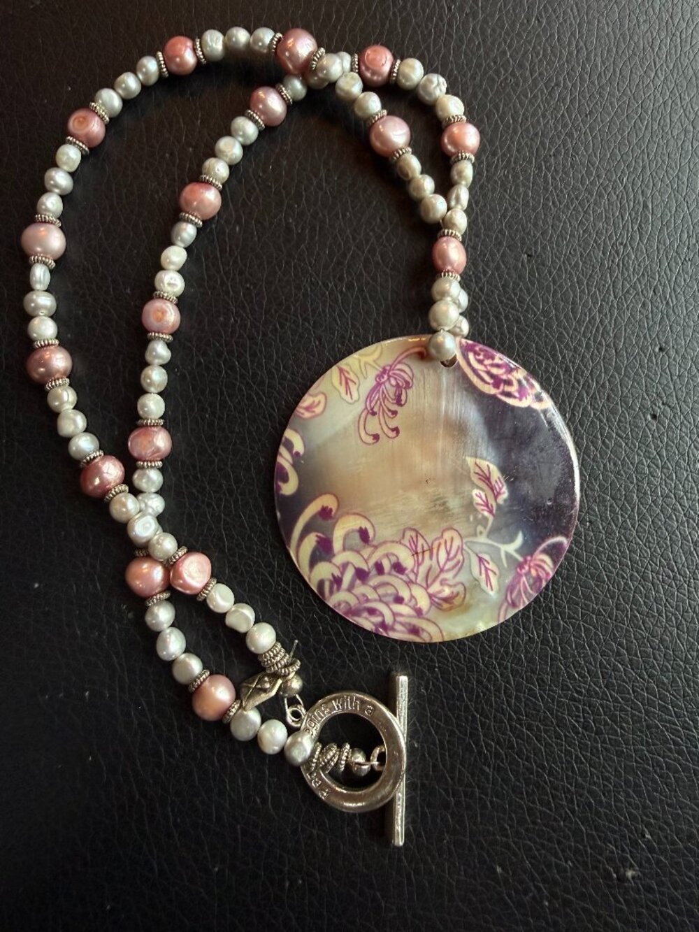 Beaded necklace with shell pendant